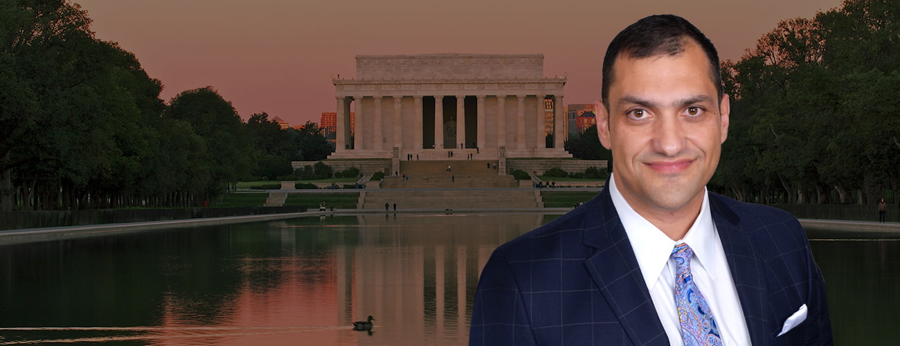 Attorney's photo with Miami buildings behind